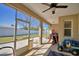 Screened patio area perfect for outdoor relaxation and entertainment with open backyard views at 2110 Saddlewood Dr, Bartow, FL 33830