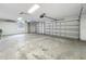 This spacious garage features multiple doors, a window, and ample overhead storage at 2204 Kettle Dr, Orlando, FL 32835