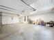 This spacious garage features ample storage space and a garage door at 2204 Kettle Dr, Orlando, FL 32835
