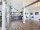 Bright living room featuring hardwood floors, high ceilings, and lots of natural light at 2204 Kettle Dr, Orlando, FL 32835