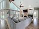 Living room featuring high ceilings, large windows and views to the pool at 2204 Kettle Dr, Orlando, FL 32835