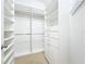 Walk-in closet with custom shelving and ample storage space in a bright, organized layout at 2204 Kettle Dr, Orlando, FL 32835