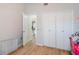 Bedroom featuring closet, storage, and modern design, offering ample space and style at 2254 Firestone Pl # 2254, Winter Haven, FL 33884
