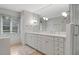 Elegant bathroom with double sink vanity, large mirror, and walk-in shower at 2300 N Scenic Hwy # 89, Lake Wales, FL 33898
