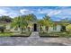 Charming home featuring professional landscaping and a beautiful paved driveway and entryway at 2300 N Scenic Hwy # 89, Lake Wales, FL 33898
