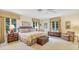 Inviting bedroom with large windows, a comfortable bed, and stylish furnishings at 2300 N Scenic Hwy # 89, Lake Wales, FL 33898