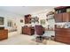 Home office with built-in shelving and cabinetry, adjacent to a bedroom at 2300 N Scenic Hwy # 89, Lake Wales, FL 33898