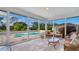 Bright sun room with a full view of the pool and grounds at 2300 N Scenic Hwy # 89, Lake Wales, FL 33898