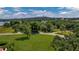 Expansive green lot with lush trees, street view, and open grassy area at 2300 N Scenic Hwy # 61, Lake Wales, FL 33898