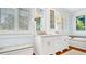 Bright bathroom with double vanity, large windows, and a soaking tub at 2300 N Scenic Hwy # 61, Lake Wales, FL 33898