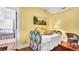 Bedroom with yellow walls and hardwood floors at 2300 N Scenic Hwy # 61, Lake Wales, FL 33898