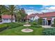 Beautiful home with a tile roof, two-car garage, and a three-tiered fountain at 2300 N Scenic Hwy # 61, Lake Wales, FL 33898