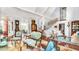 Bright living room with terra-cotta tile, ornate furnishings, and elegant details with access to outdoor space at 2300 N Scenic Hwy # 61, Lake Wales, FL 33898