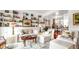 Bright living room boasts built-in bookshelves, hardwood floors, and comfortable seating at 2300 N Scenic Hwy # 61, Lake Wales, FL 33898