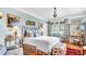 Inviting bedroom with a large bed, charming decor, and bright natural light at 2300 N Scenic Hwy # 61, Lake Wales, FL 33898