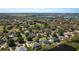 Beautiful community aerial view with lakes and mature trees surrounding single Gathering homes at 315 Bayberry Dr, Polk City, FL 33868