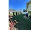 Well-maintained backyard with lush lawn, privacy hedges, and room for outdoor activities at 315 Bayberry Dr, Polk City, FL 33868