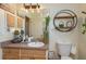 Bathroom with wooden cabinets and nice decor at 315 Bayberry Dr, Polk City, FL 33868