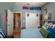 Cozy bedroom with storage above closet, featuring an ensuite bathroom at 315 Bayberry Dr, Polk City, FL 33868