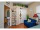 Bedroom with cozy seating area, decorative wall shelving, and lots of closet space at 315 Bayberry Dr, Polk City, FL 33868
