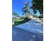 Well-manicured front yard and driveway with curb appeal and a beautifully landscaped lawn at 315 Bayberry Dr, Polk City, FL 33868