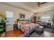 Inviting main bedroom with stylish decor, plush bedding, and ample natural light, creating a relaxing retreat at 315 Bayberry Dr, Polk City, FL 33868