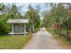Paved walking trail access point featuring a covered information kiosk and scenic views at 315 Bayberry Dr, Polk City, FL 33868