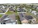 An aerial view of the homes with solar panels on the roofs at 318 Gladesdale St, Haines City, FL 33844