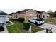 Beautiful front yard with lush landscaping and well-maintained lawn at 318 Gladesdale St, Haines City, FL 33844