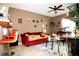 This living room provides a relaxing atmosphere at 318 Gladesdale St, Haines City, FL 33844