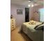 Cozy bedroom featuring a comfortable bed, soft lighting, and a closet space at 32 Berna Cir, Winter Haven, FL 33884