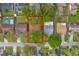 Aerial view of the property, highlighted by a red outline, showcasing its location within the neighborhood at 3323 Fox Ridge Dr, Winter Haven, FL 33884