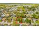 Aerial view of the property within a red box, showcasing its location in relation to the nearby lake and amenities at 3323 Fox Ridge Dr, Winter Haven, FL 33884