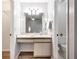 Bathroom featuring a spacious vanity, modern fixtures, and access to an adjacent toilet room at 3323 Fox Ridge Dr, Winter Haven, FL 33884