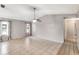 Spacious living area featuring tile flooring, neutral walls, and window views at 3323 Fox Ridge Dr, Winter Haven, FL 33884
