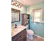 Bathroom with a modern sink, faucet, vanity, and a stylish shower curtain at 3430 Cove E Ct, Winter Haven, FL 33880