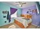 Bedroom with light colored carpet, window and ceiling fan at 3430 Cove E Ct, Winter Haven, FL 33880