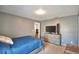 Neutral bedroom featuring a TV, dresser, and ample space at 3430 Cove E Ct, Winter Haven, FL 33880
