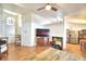 Spacious living room featuring vaulted ceilings, wood-look tile flooring, and an open floor plan at 3430 Cove E Ct, Winter Haven, FL 33880