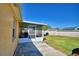 A spacious, screened-in patio offering clear views to a well-maintained yard at 3430 Cove E Ct, Winter Haven, FL 33880