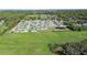 A high angle picture displays this home in a peaceful, nature-filled suburban neighborhood at 3467 Sutton Ridge St, Lakeland, FL 33810