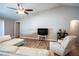Bright living room with wood flooring and vaulted ceiling at 3467 Sutton Ridge St, Lakeland, FL 33810