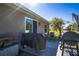 Outdoor patio area with grilling space and seating, perfect for entertaining at 3467 Sutton Ridge St, Lakeland, FL 33810