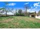 The home features a large grassy backyard at 352 W Graham Park Dr, Haines City, FL 33844