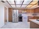 A bright kitchen with stainless steel appliances and skylight ceiling at 352 W Graham Park Dr, Haines City, FL 33844