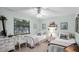 Cozy bedroom with twin beds, dresser, and window with natural light at 3614 Twisted Oak Ct, Lake Wales, FL 33898