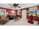 View of office with calming color scheme and a cozy couch near the windows at 3614 Twisted Oak Ct, Lake Wales, FL 33898