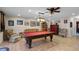 Cozy recreation room featuring a pool table, comfortable seating, and stylish decor at 3614 Twisted Oak Ct, Lake Wales, FL 33898