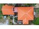 Aerial view of a sprawling two-story home with a terra cotta tile roof and lush landscaping at 3655 N Scenic Hwy, Lake Wales, FL 33898
