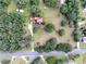Breathtaking aerial perspective displaying property with large lot surrounded by verdant trees at 3655 N Scenic Hwy, Lake Wales, FL 33898